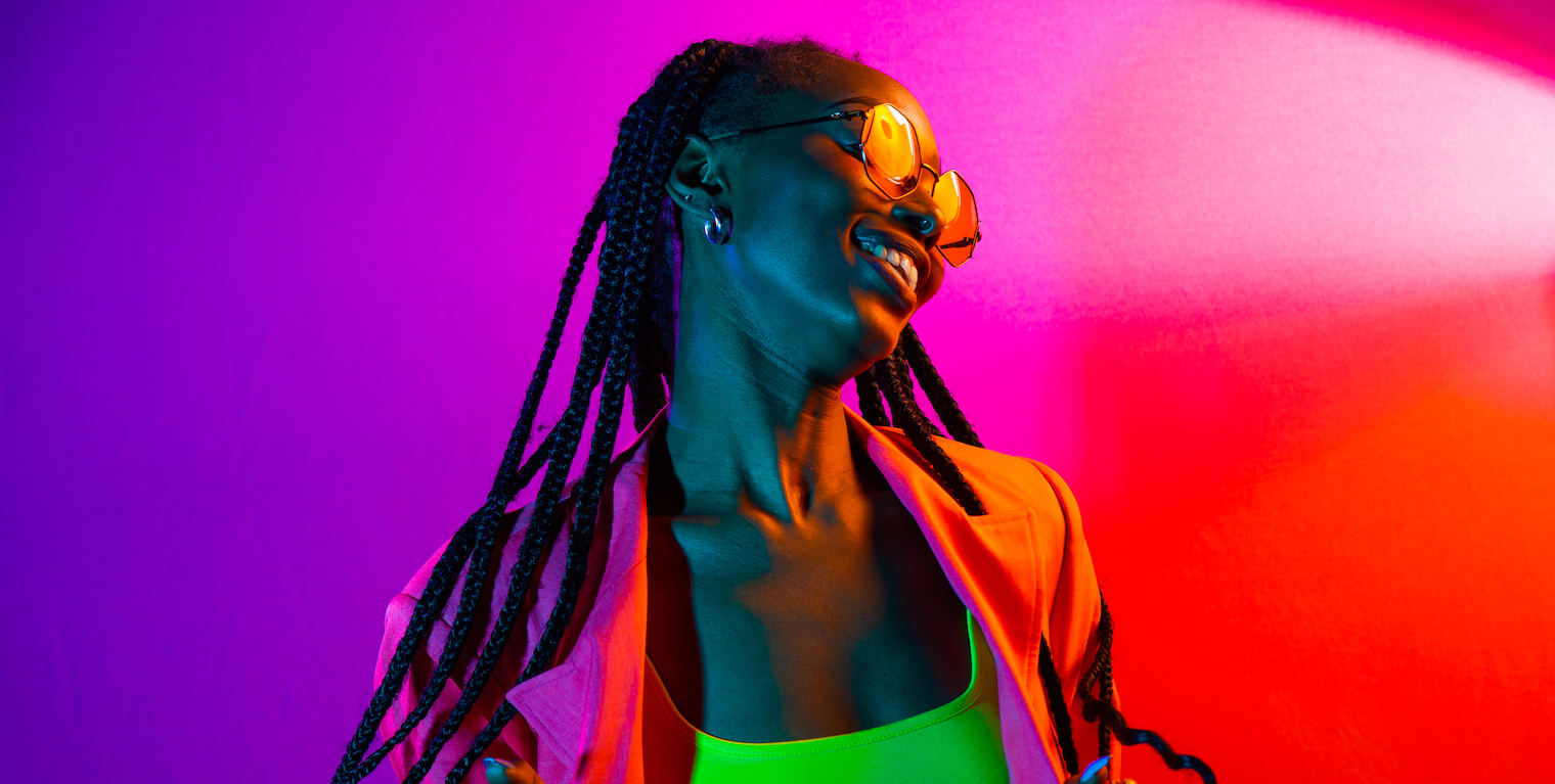 how real-time data changes the company expense game - woman with color filter over her face