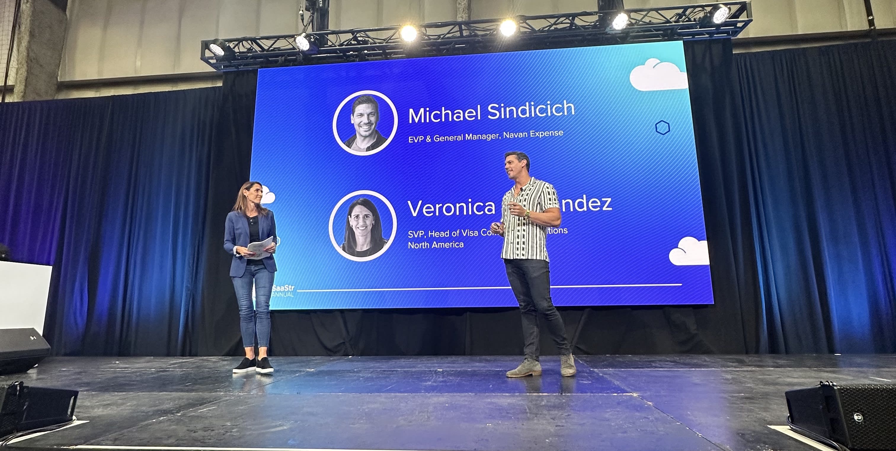 Navan Expense GM Michael Sindicich and Veronica Fernandez, the North America Head of Commercial Solutions at Visa, on stage at SaaStr.