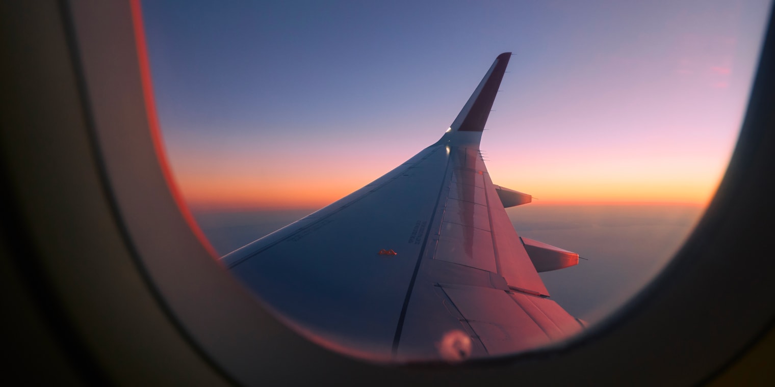 corporate travel solution view for an airplane window