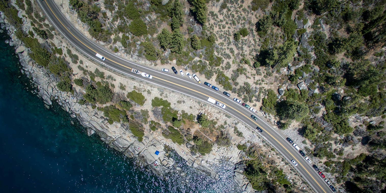 Aerial view of a highway along the coast of northern California where there are many locations for corporate travel retreats