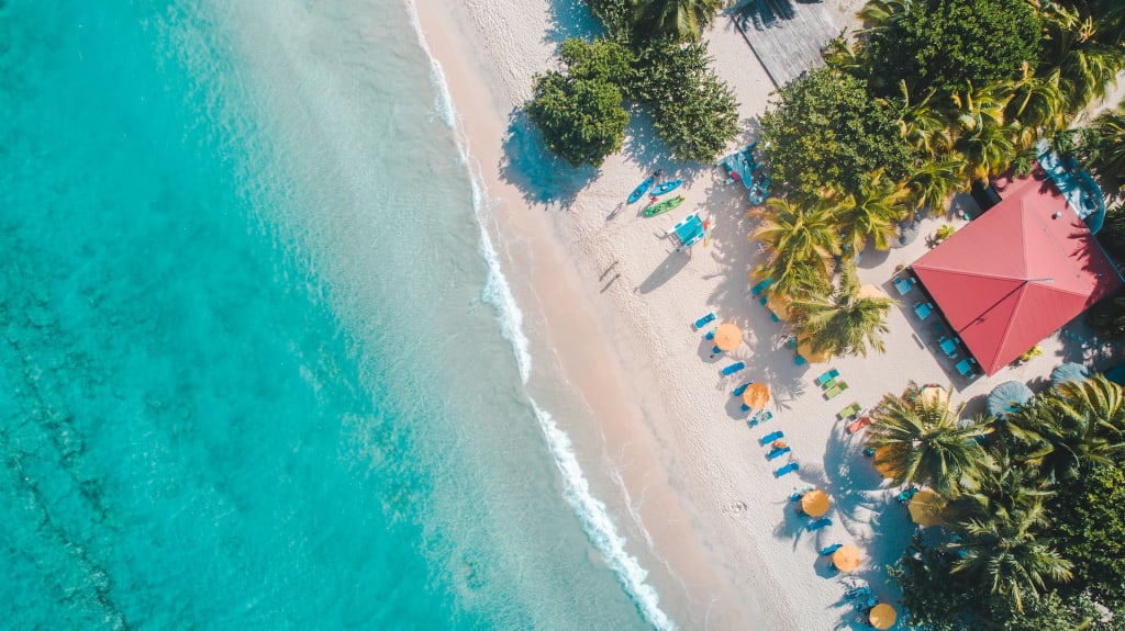 5 Reasons For Stunning Off-Season Travel 1 Beach Bar, Grand Anse Beach | Grenada, Caribbean as your next off-season travel plan