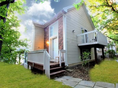 Fantastic & Private Wooded END Unit Townhouse w/ vaulted ceilings.