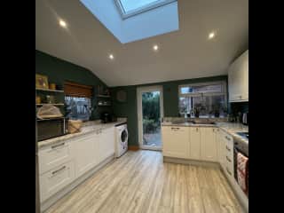 Kitchen diner area leading onto garden - fridge and cupboards will be fully stocked for your use :)