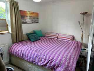 Big comfy bed, will dress it with a nicer duvet cover for your stay!