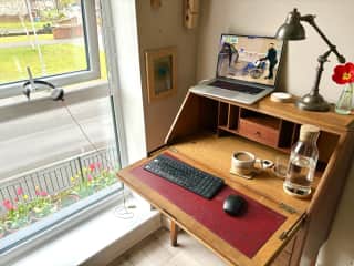 The second home office where you can work with views of the front garden, the communal green space, the canal and pond, and the resident birds