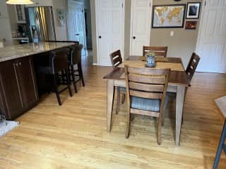Kitchen table and island with barstools