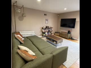 Our cozy living room with our bed couch