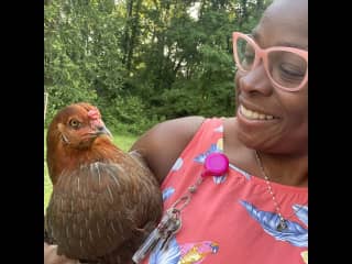 Me and my oldest chick. Big bird. I hatched her in my office.