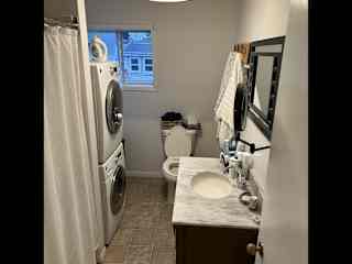 Main Bath with stackable washer/dryer