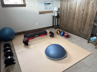 Upstairs exercise room with Murphy bed