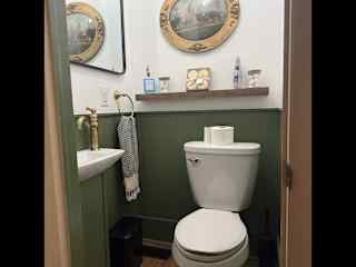 The half bath off of the guest room.