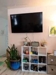 Huge TV with all the streaming channels & Home Gym Equipment