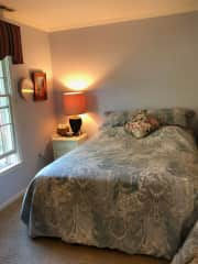 Comfortable, sunny guest room with queen bed