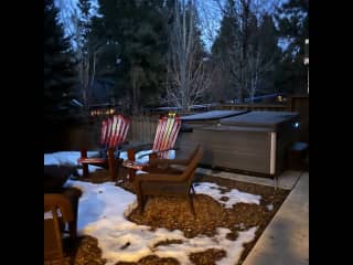 backyard with firepit and hot tub