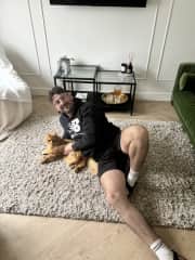 Josh playing with Charlie on the new rug
