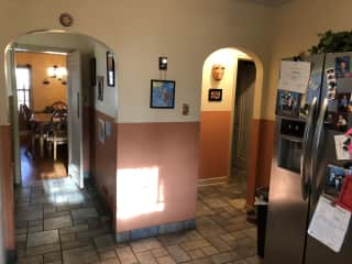 View from kitchen into dining nook and dining room