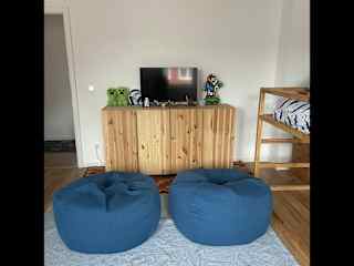 Kids room also has a little setup to watch tv on beanbags.