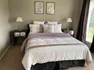 Guest Bedroom No.1 looking out over the front driveways and fountain.