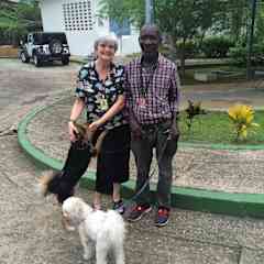 Deb traveled to Africa while working in Ebola research. While there, she missed her own furkid tremendously so got her dog fix by helping out the local man charged with walking the dogs of U.S. personnel stationed at the American embassy in Monrovia.