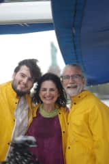 With our son Liam on a rainy sail under the watchful eye of Lady Liberty!