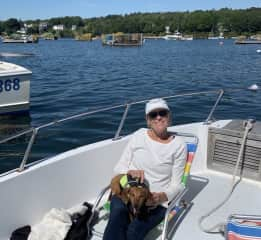 on our boat with our dog, hoagie