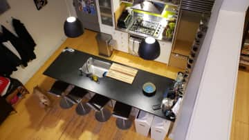 Kitchen seen from second floor mezzanine. Say hi, Whiskey!