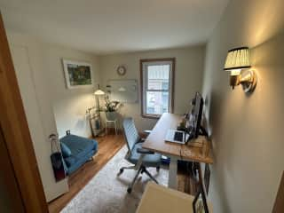 Middle upstairs room used as home office. Blue chair folds out to a twin  - upstairs