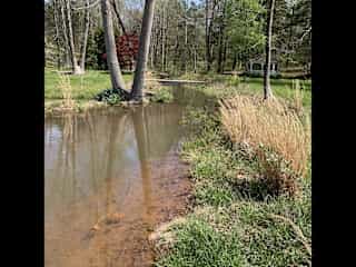 Creek on left side of house