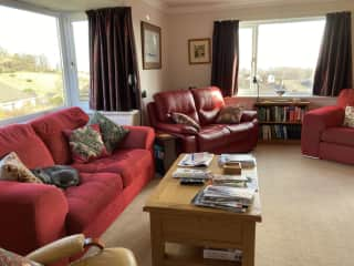 Sitting Room looking towards side of house. Luca in usual place!