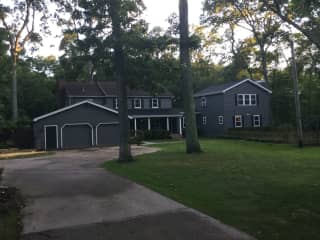 House to the right of the trees