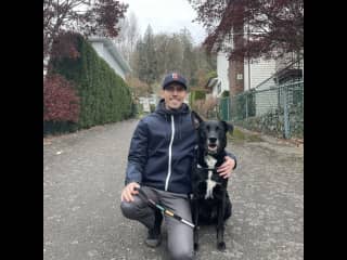 Dominic with Sam, a reactive dog whom we coached to be calmer while walking.