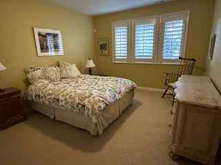 Second bedroom, powder room nearby