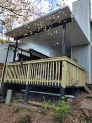 Covered pergola - porch.
There is a fan and overhead light.