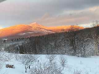 View of Camels Hump Mountain during the winter months.  This photo captures the alpine glow.
