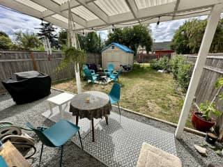 Backyard
Now a 2-3 person hot tub between the grill and table.