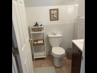 Your own en-suite full bathroom (shower is to the left behind door) with toiletry/shower basics, towels etc.