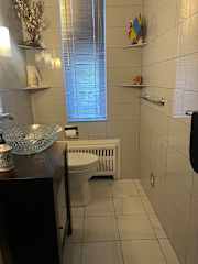 Half-bath off of main kitchen on main floor