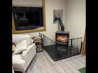 Woodburner with safety surround in case young children are present.