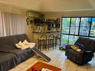 Bar room with large TV.
