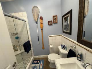 One of the 3 guest bathrooms, this one is shower only, another has a bath and shower combo, and the third one is larger but shower only.