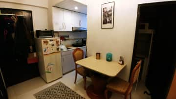 Dining space with 3 chairs.