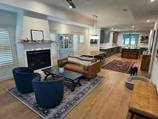 Open sitting area, dining and kitchen.