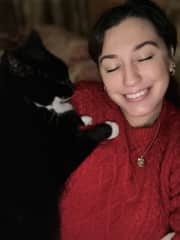 Snuggling with Thistle on a month long sit in the UK