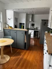 Bright kitchen with a small dining area.