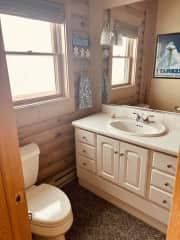 Attached bathroom with tub/shower