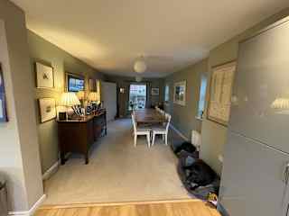 Dining room with large table.