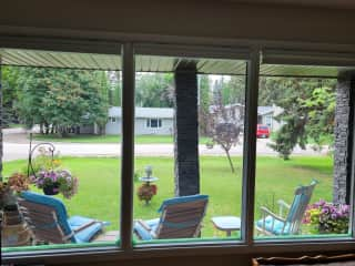 The summer view looking across the front yard from our living room