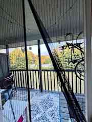 Back porch with bikes to borrow and little sitting area.