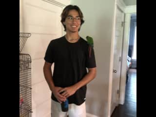 My youngest son and a green cheeked parrot
