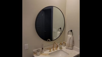 Vanity area in guest bathroom.